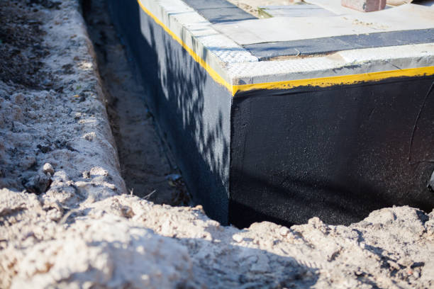 Professional Interior Drainage System technician working in Etowah, NC